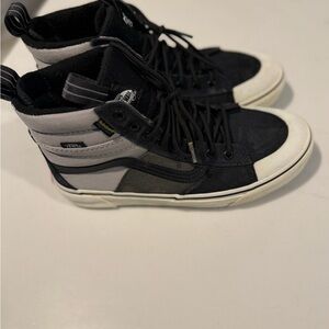 Vans Black and White High-Top Sneakers